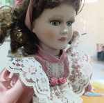 Porcelain doll used with cracked forehead from fall