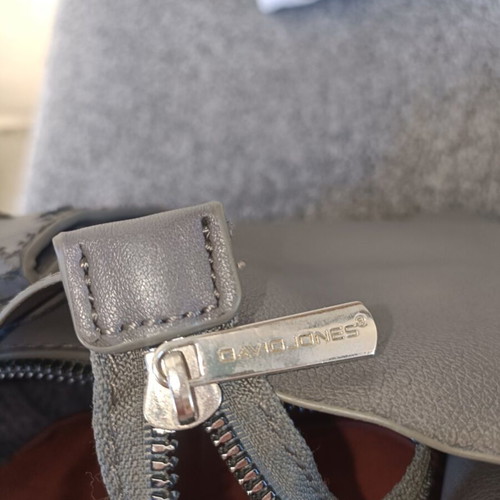 David Jones gray shoulder bag used with decorative wear