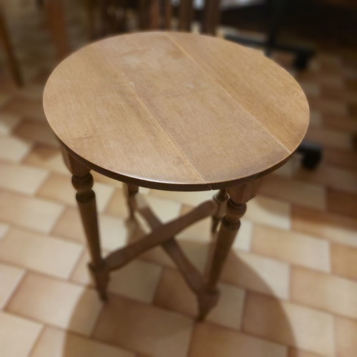 Rectangular table with 4 used round nesting tables