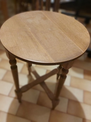 Rectangular table with 4 used round nesting tables
