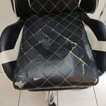 Gaming chair used with footrest made of leatherette