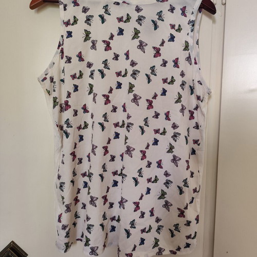 White sleeveless blouse with butterflies XL used