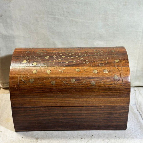 Vintage wooden chest with brass inlay used