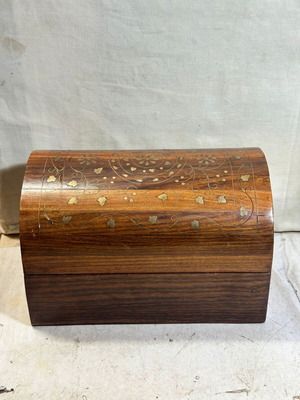 Vintage wooden chest with brass inlay used