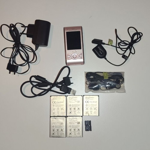 Sony Ericsson W595 Walkman Pink Edition used with accessories