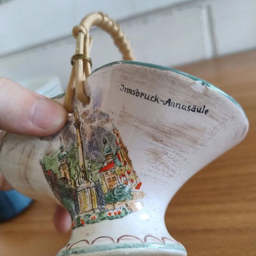 Decorative small ceramic basket used with wear marks