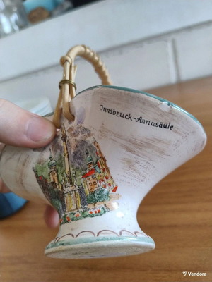 Decorative small ceramic basket used with wear marks