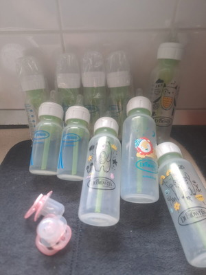 Dr. Brown's bottles new and used with pacifiers