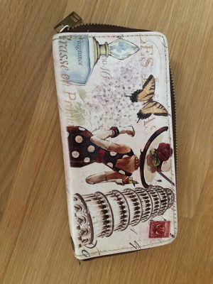 Wallet used with wear on inner zipper
