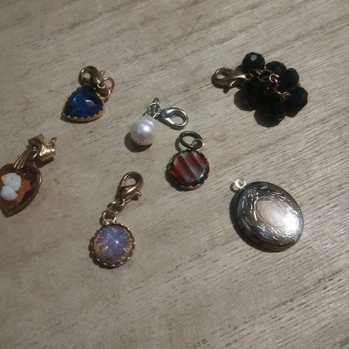 Old pendants used, set of 7 multicolored