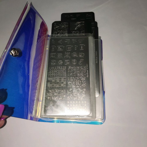 Nail stamping plates like new with storage book