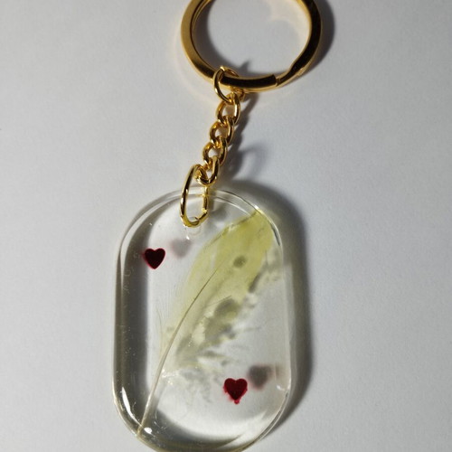 Handmade keychain with feather and hearts, like new