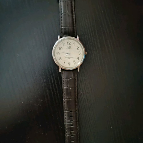 Quartz wristwatch men's used, black