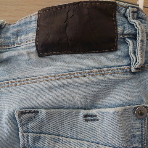 Attrativo light blue jeans with rips used, size 28