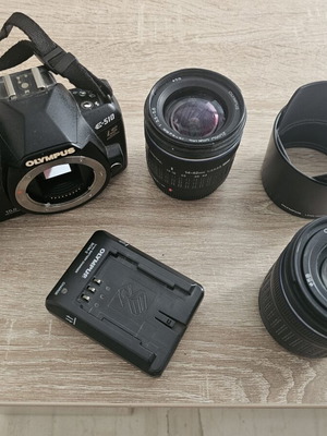 Olympus DSLR camera kit used with 2 Zuiko lenses and BCM-2 charger
