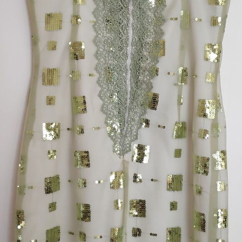 Dress green light with sequins size 48 like new