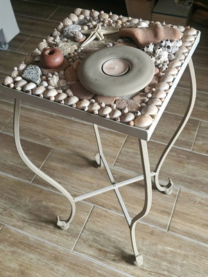 Vintage metal table with shells and tealight like new