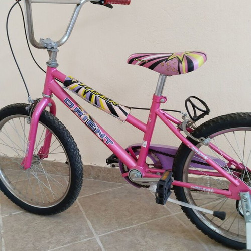 Girls BMX bike used with training wheels