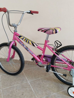 Girls BMX bike used with training wheels