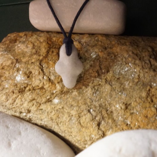 Collectible Cycladic marble and stone cross pendant, hand-carved