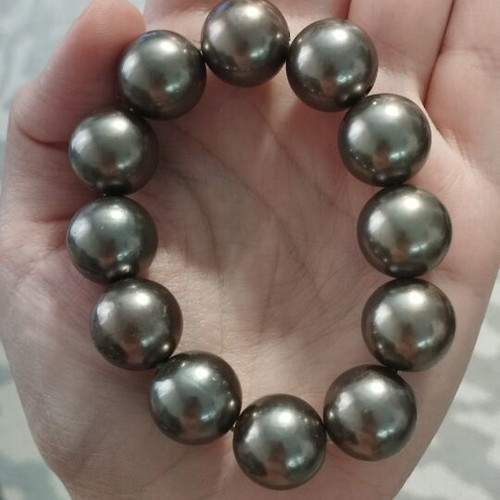 Elastic bracelet with large beads in anthracite metallic gray, like new