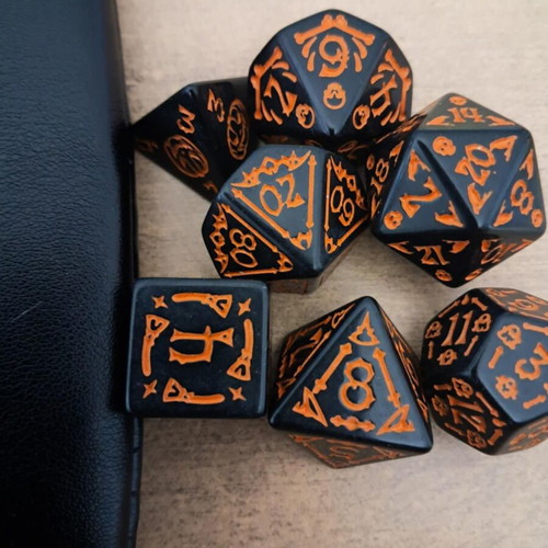 Big black faux-leather dice bag with black spooky D&D dice set