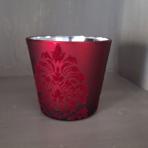 Glass candlestick like new with embossed velvet and silver glazing