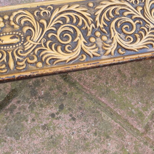 Metallic vintage curtain rail with brass coloured details used