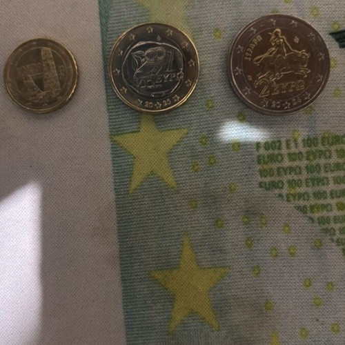 Set of three euro coins used