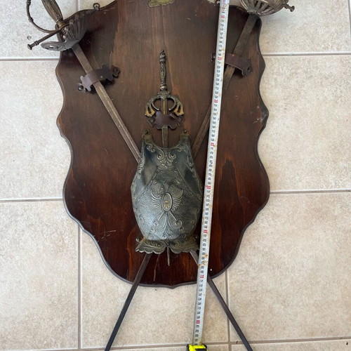 Antique armor and swords used on wood