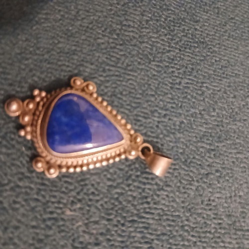 Silver pendant with blue stone like new