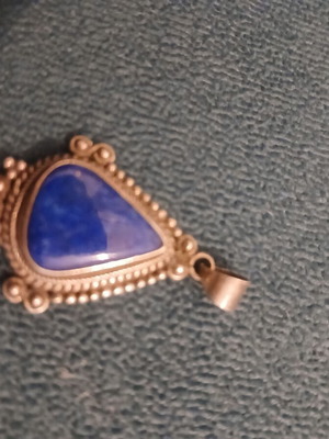 Silver pendant with blue stone like new
