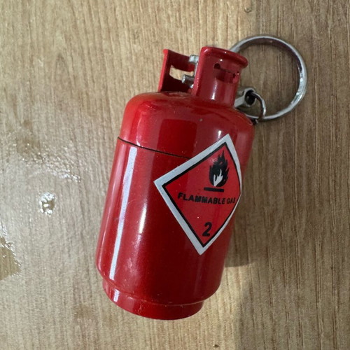 Bottle lighter used, unknown if working