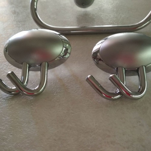 Bathroom accessory set like new with light, paper holder, and double hooks