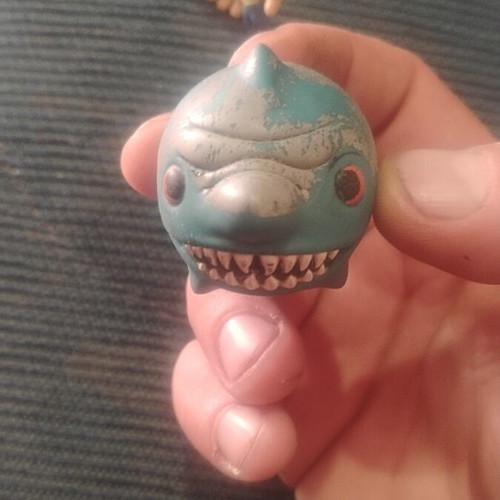 Collectible toy figures with wear, set of 2