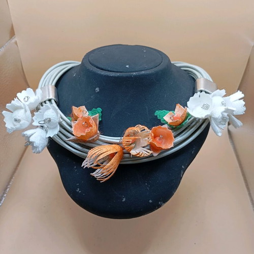 Handmade necklace with dyed silk cocoons in orange and white