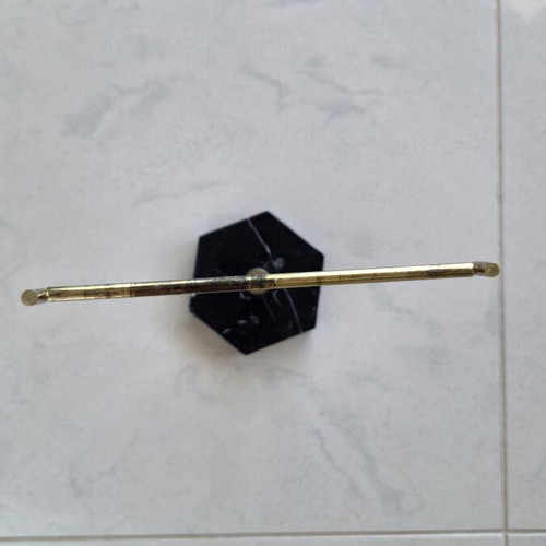 Jewelry stand used with black hexagonal marble base