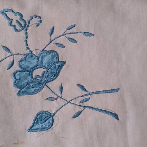 Vintage cotton bed sheets with blue satin appliqué pattern and pillowcases like new