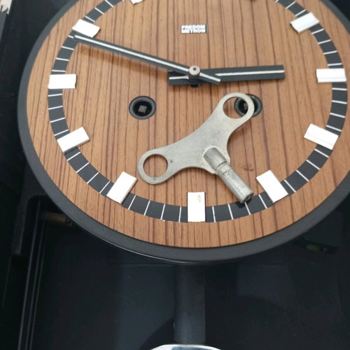 Wooden wall clock used, dimensions 45x25 cm