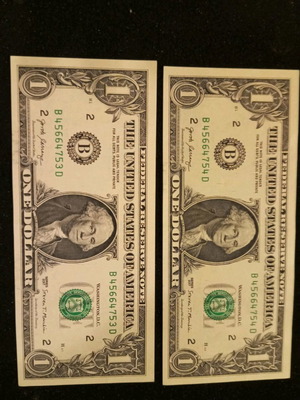Dollars with consecutive numbers new, perfectly glued