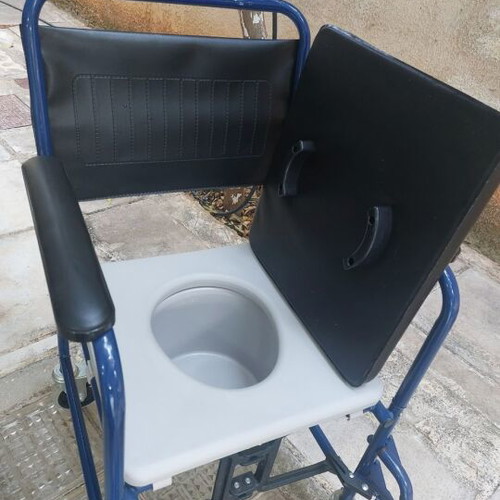 Commode wheelchair with metal frame, like new