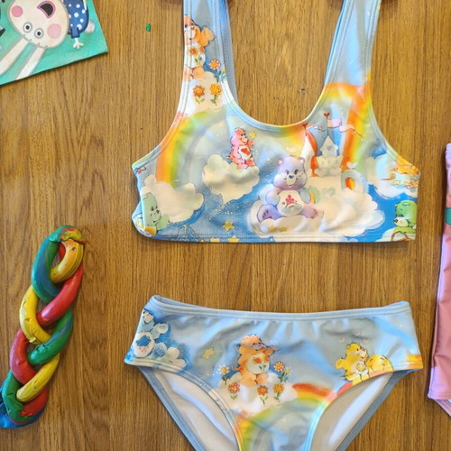 H&M Care Bears swimsuit like new for ages 4 - 6 colorful pink