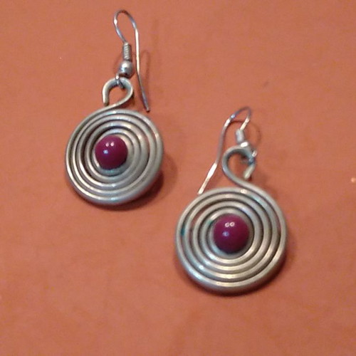 Earrings with purple beads