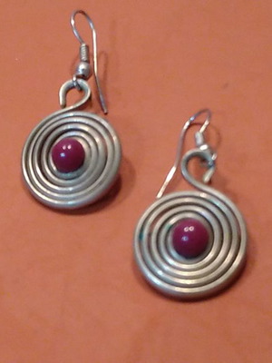 Earrings with purple beads