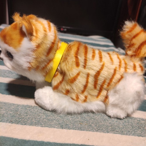 Interactive plush cat with yellow collar, like new
