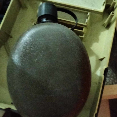 Plastic military canteen with clip - ring like new