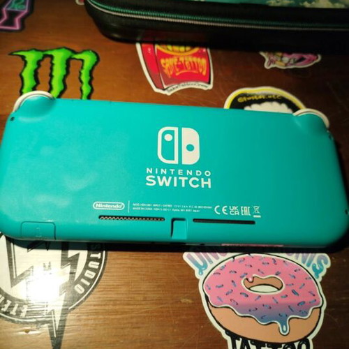 Nintendo Switch Lite Turquoise 32GB bundle with case and SD card used