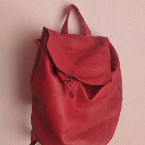Red leather backpack new, adjustable straps, drawstring closure