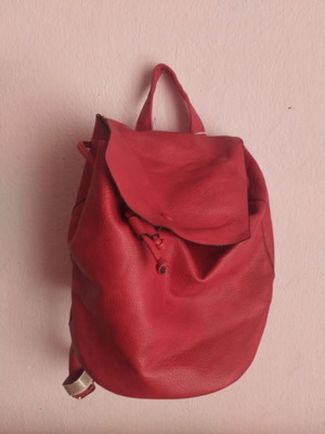 Red leather backpack new, adjustable straps, drawstring closure