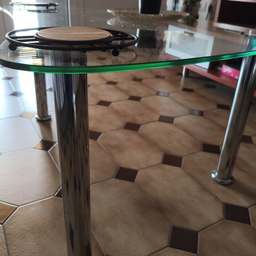 Glass coffee table with metal legs